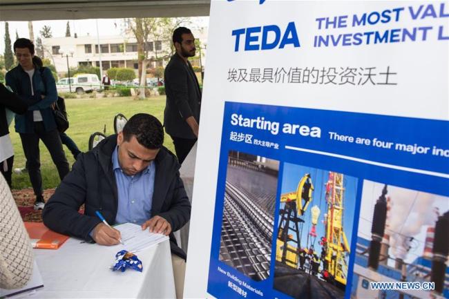 An Egyptian student attends a recruitment fair at the Suez Canal University in Egypt's Ismailia Province, April 15, 2019. [Photo: Xinhua]